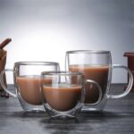 Set of clear double wall coffee cups with milk