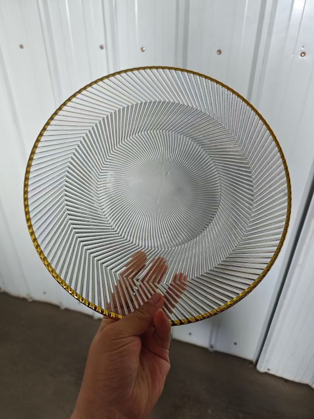 Clear 13 inch glass charger plate with thin gold rim and radial lines